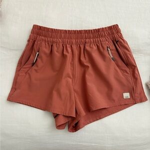 Vuori Women's Athletic Shorts in Terracotta